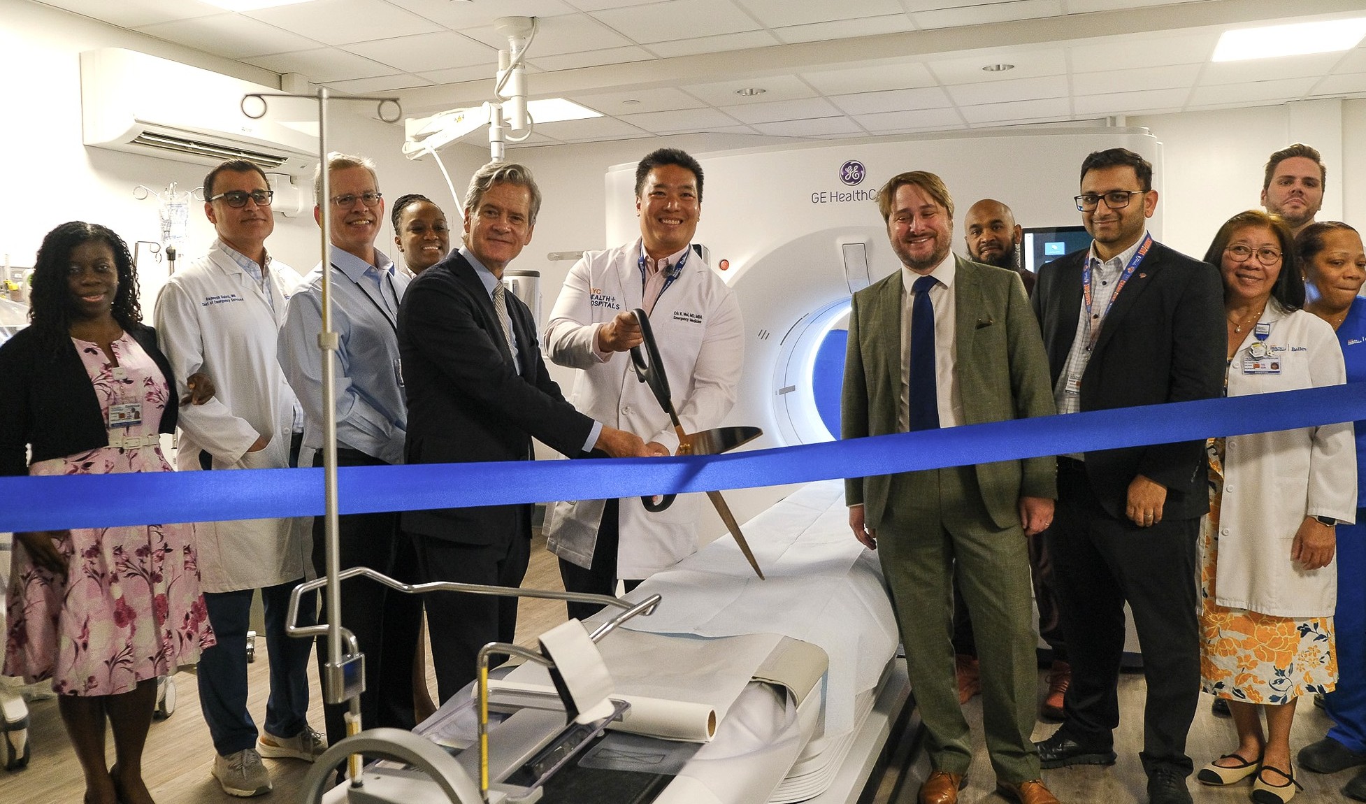 Manhattan Borough President Brad Hoylman-Sigal (left) and Bellevue Hospital CEO Dr. Eric Wei (center) join hospital leadership and staff to celebrate the ribbon cutting of a second new CT scanner in Bellevue Hospital’s Emergency Department.