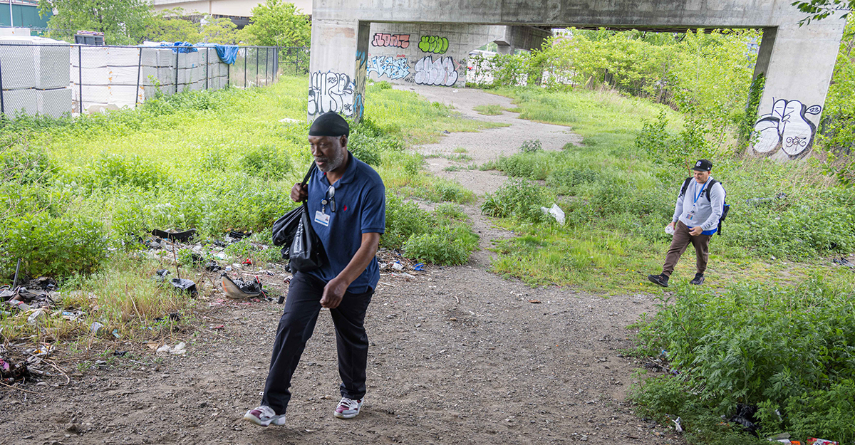 While many care providers work in traditional spaces like hospitals, clinics, nursing homes and residential settings, Jose and Andre tread paths that many of us would never dare take. Here, they make their way to a homeless encampment adjacent to the 138th Street bridge for a wellness check. (4/4)