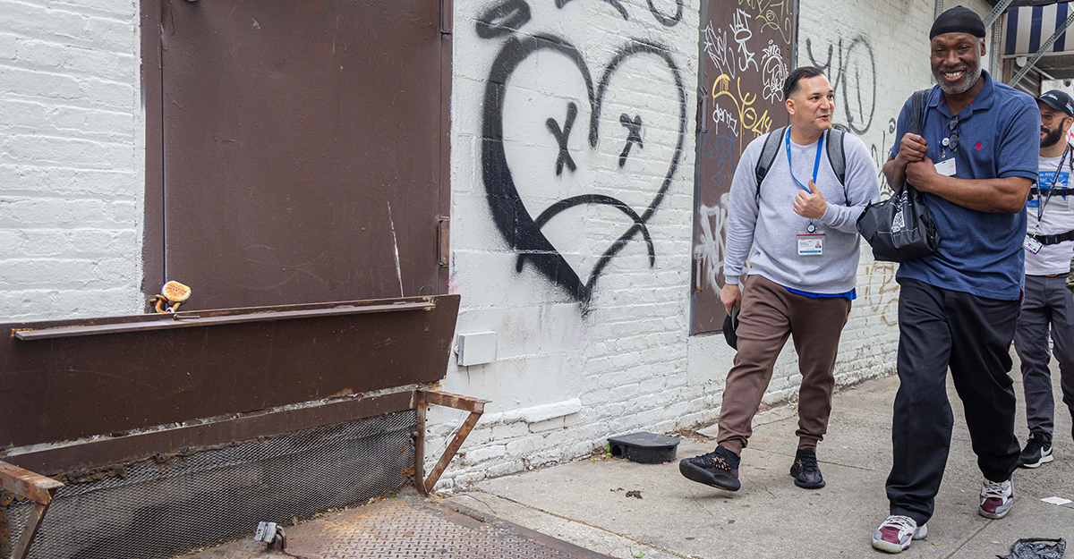 Jose Capo (left) and Andre Jordan (right) hit the road in Mott Haven to deliver much-needed services.