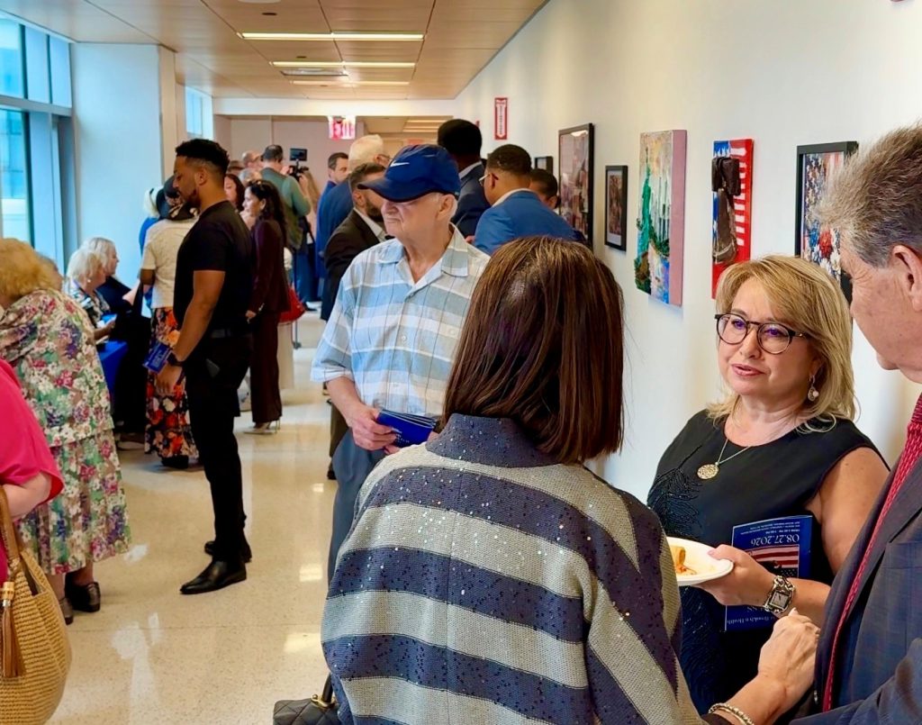Nearly 100 people attended the exhibition’s opening night.