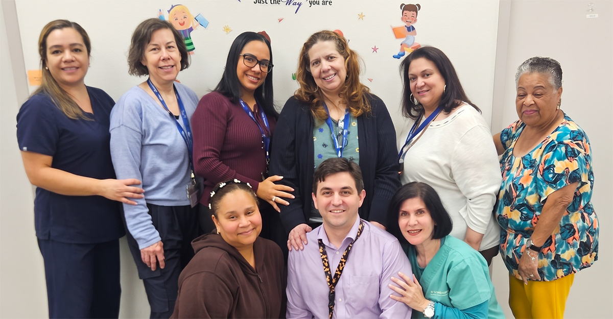 Dr. John Gaipa (front center), Developmental-Behavioral Pediatrician with members of the multidisciplinary developmental-behavioral pediatrics team at NYC Health + Hospitals/Gotham Health, Morrisania. The team works collaboratively to provide comprehensive, coordinated care for children with developmental and behavioral challenges.